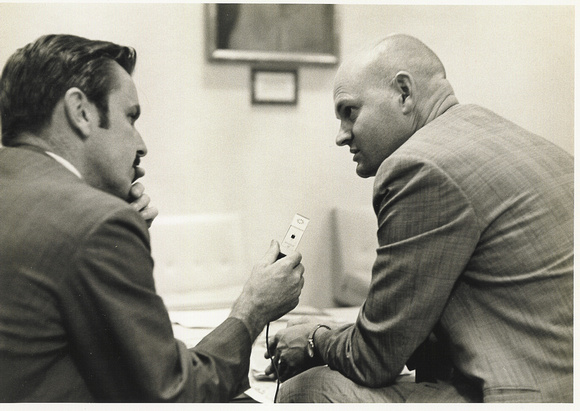 Rex Vermillion (right) giving radio interview
