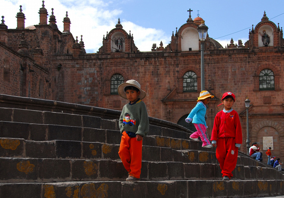 Kids on cathedral steps in Cuzco