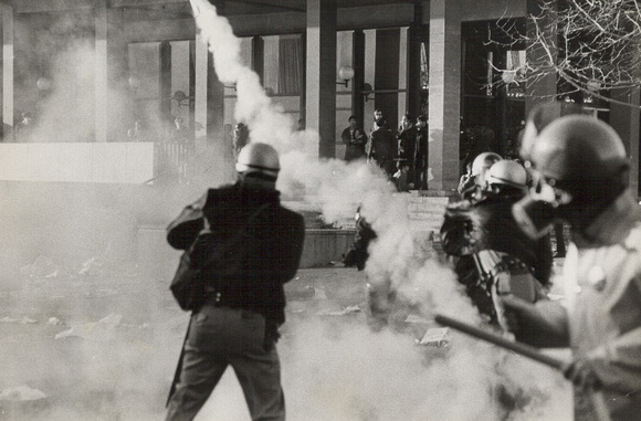 Police use tear gas at campus riot in '60s