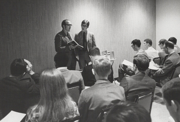Dr. William C. Martin (standing, left) and and student leader, Barry Davis from Texas Tech